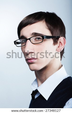 stock photo : cute young guy with fashion haircut wearing glasses