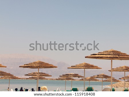 Umbrellas at the Dead Sea hotel beach