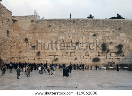 JERUSALEM, ISRAEL  -  March 13 :   Pilgrims and tourists visiting Western wall on March 13, 2012 in Jerusalem, Israel. Western or Wailing wall is world known most visiting Jewish holy place