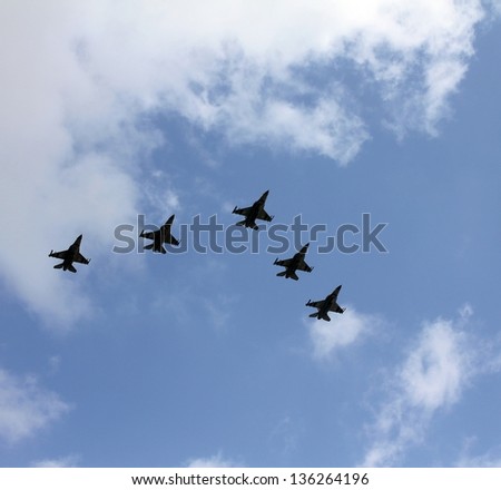 TEL AVIV, ISRAEL -?? APRIL  16: Israeli Air Force airplanes (five jet fighters) at parade in honor of Independence Day on April 16, 2013 in Tel Aviv, Israel