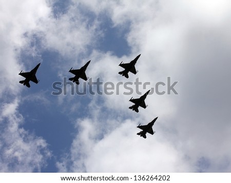 Israeli Air Force airplanes (five jet fighters) at parade in honor of Independence Day