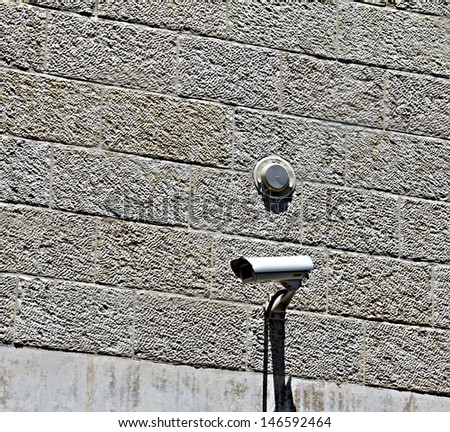 Security Camera on the stone wall