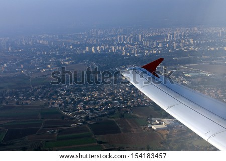 Tel Aviv with a bird\'s-eye view from airplane window