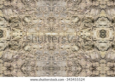 Abstract decorated stone wall.  You can use this picture as background for your works