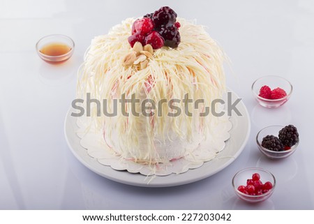Delicious Grated Coconut Berry Cake On White Background