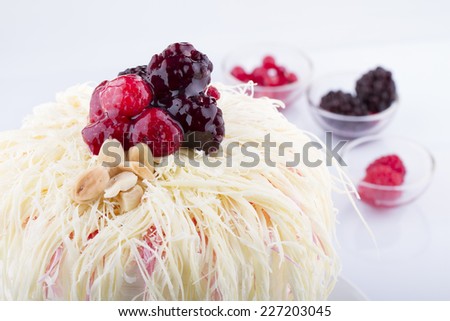 Delicious Grated Coconut Berry Cake On White Background