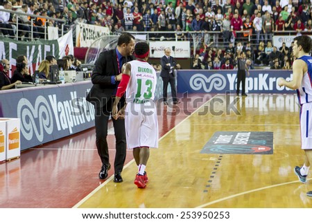 IZMIR - FEBRUARY 15: Pinar Karsiyaka\'s coach UFUK SARICA has tactics to his player in Turkish Basketball League game between Pinar Karsiyaka 92-84 Anadolu Efes on February 15, 2015 in Izmir