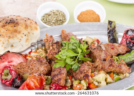 Turkish and Arabian Traditional Food Kebab Adana Urfa Abbaganus Sogurme with Yogurt
