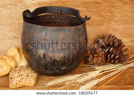 Rustic casserole with seeds bread and pine corns