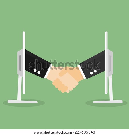 Partnership handshake to business success Online via computer