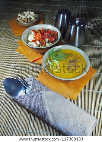From soup to nuts. A light meal consisting of vegetable puree soup, noodles with bell pepper, cashew nuts and almonds.