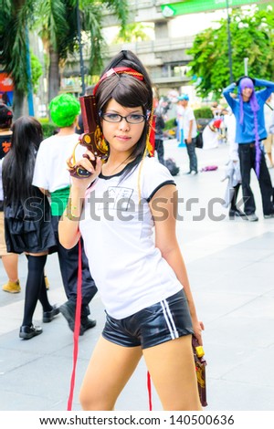 BANGKOK - MAY 25 : An unidentified Japanese anime cosplay pose in Oishi World Cosplay Fantastic 7 on May 25, 2013 at Central World, Bangkok, Thailand.