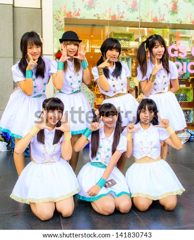 BANGKOK - MARCH 30 : An unidentified Cover Girl Band cosplay pose in Thai-Japan Anime Music Festival 3 on March 30, 2013 at Central World, Bangkok, Thailand.