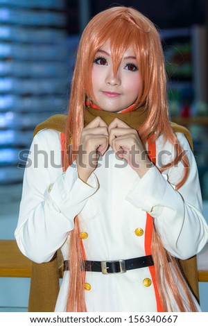 BANGKOK - SEPTEMBER 15: An unidentified Japanese anime cosplay pose in Comic party 58th in Bangkok by Wacoal on September 15, 2013 at Central Rama 9, Bangkok, Thailand.