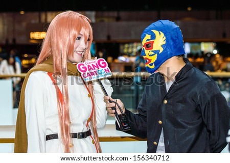 BANGKOK - SEPTEMBER 15: An unidentified Japanese anime cosplay pose in Comic party 58th in Bangkok by Wacoal on September 15, 2013 at Central Rama 9, Bangkok, Thailand.
