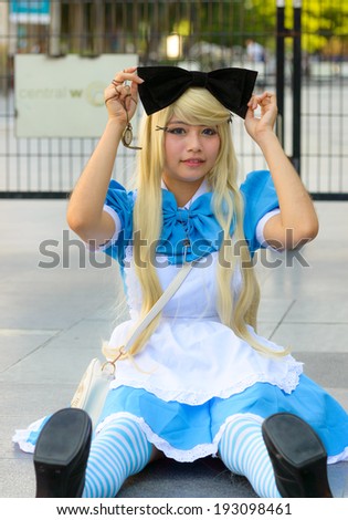 BANGKOK - MAY 03 : Cosplayer as characters Alice from Walt Disney Ã?Â¢??Alice in Wonderland\