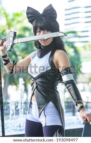 BANGKOK - MAY 03 : An unidentified Japanese anime cosplay pose in Thai-Japan Anime Music & Festival 4 on May 03, 2014 at Central World, Bangkok, Thailand.