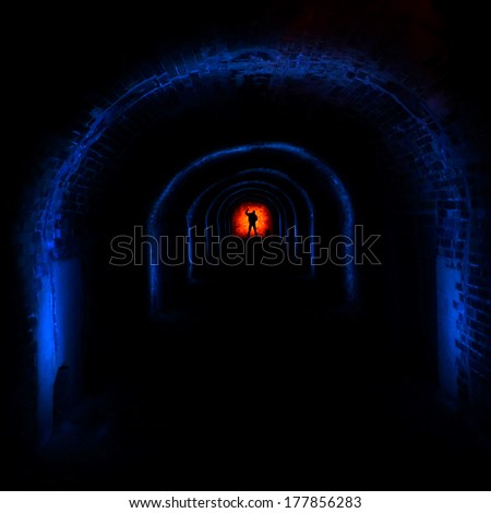 Light painting in the tunnel in abandoned factory at Southern Finland. Urban exploration.