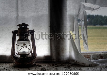 Urban exploration. Oil lamp in old abandoned farm house at Southern Finland.