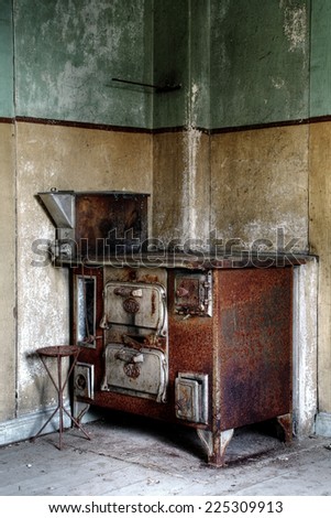 Old, rusty stove in old, abandoned farm house in Southern Finland. Urban exploration.