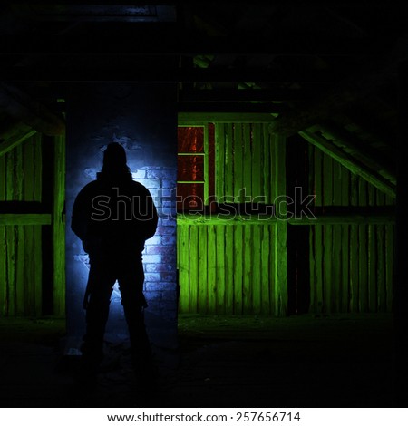 Long exposure light painting in the attic at old, abandoned farm in Southern Finland.
