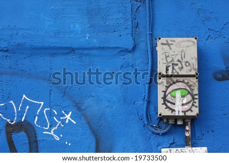 Blue wall background Perfect background picture of a blue wall with an electricity cabinet
