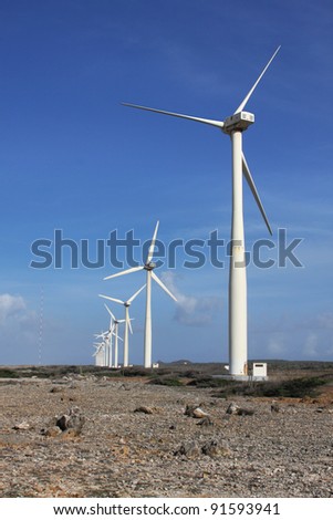 Windmill farm Wind farm or Wind turbines to harvest wind energy. Located on the Hato plains on Curacao