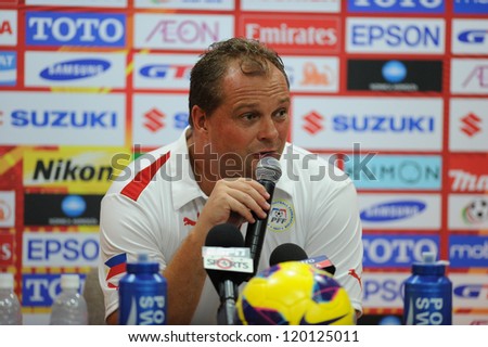 BANGKOK, THAILAND - NOV 24:Head Coach Hans Michael Weib of Philippines for the ball during the AFF SUZUKI CUP 2012 between Thailand and Philippines at Rajamangkala stadium on Nov 24,2012 in Thailand.