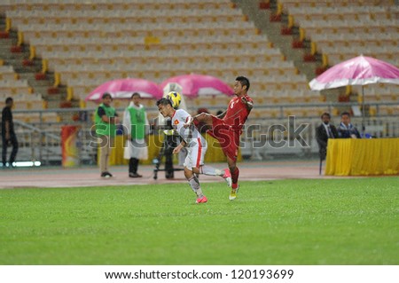  - stock-photo-bangkok-thailand-november-kyi-lin-of-myanmar-r-in-action-during-the-aff-suzuki-cup-120193699