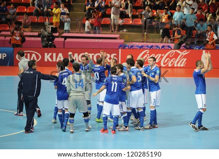 BANGKOK,THAILAND-NOV 18:Italy team celebrates after defeating Colombia during the FIFA Futsal World Cup 3rd place match between Italy and Colombia at Indoor Stadium Huamark on Nov18, 2012 in Thailand.