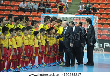 BANGKOK,THAILAND-NOV 18: FIFA President Joseph S. Blatter is seen with Players of Colombia prior to the FIFA Futsal World Cup Third Place  at Indoor Stadium Huamark on Nov18, 2012 in Bangkok,Thailand.