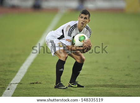 BANGKOK,THAILAND-JULY17:Cleiton Silva of Singha All-Star in action during the international friendly match Chelsea FC and Singha All-Star at the Rajamangala Stadium on July17,2013 in Thailand.