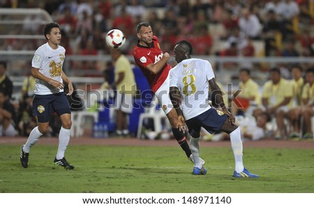 BANGKOK,THAILAND-JULY13: Ryan Giggs(L2) of Manchester United in action during the friendly match between Singha All Star and Manchester United at Rajamangala Stadium on July 13, 2013 in Thailand.