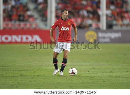 Bangkok,Thailand-July13: Ryan Giggs Of Manchester United In Action During The Friendly Match Between Singha All Star And Manchester United At Rajamangala Stadium On July 13, 2013 In Thailand.