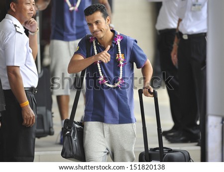 BANGKOK,THAILAND-AUGUST05:Pedro of Barcelona FC arrives at Don Muang airport in Bangkok to play the international friendly match Thailand XI and FC Barcelona on Aug05,2013 in,Thailand.