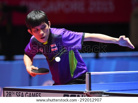 KALLANG,SINGAPORE-JUNE1:Nikom.W of Thailand in action during the 28th SEA Games Singapore 2015 between Thailand and Indonesia at Singapore Indoor Stadium on June1 2015 in SINGAPORE.