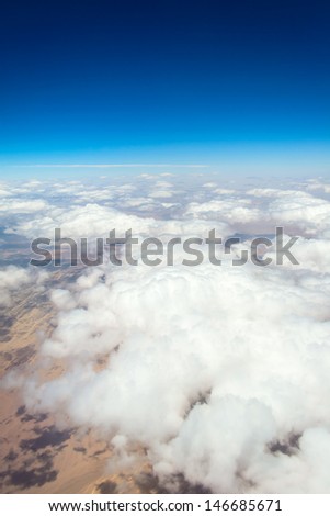 Aerial view landscape near Hurgada town over clouds in Egypt