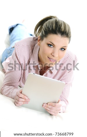 Young woman is surfing on his digital tablet