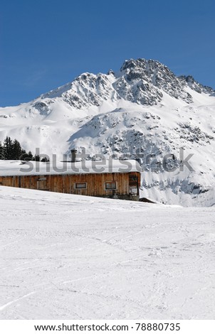 chalet in alps in winter