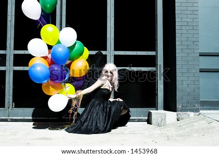 Fairy with balloons out in the sun