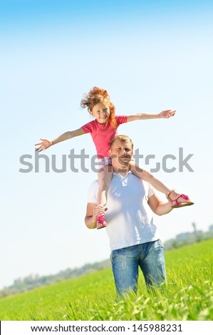 Father playing with daughter
