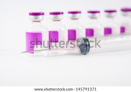 Arrange purple vial and disposable syringe