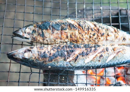 Roasted saba fish on grill