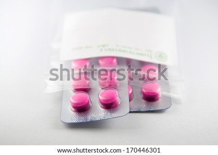 Medicine tablet blister pack in dispensing plastic bag from hospital