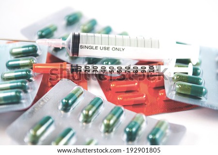 Disposable syringe on medicine blister pack