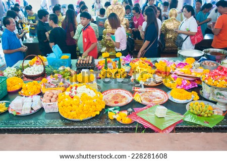 NAKORNPRATOM THAILAND - OCTOBER 23 : People praying buddha in temple on Oct 23 2014 in Thailand
