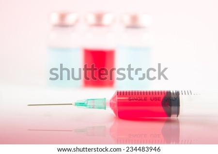 Disposable syringe and injection vial