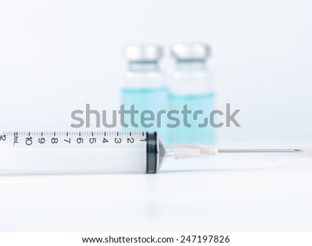 Disposable syringe and medicine injection vials