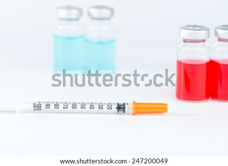 Disposable syringe and injection vials