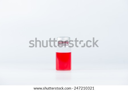 Red liquid in injection vial
